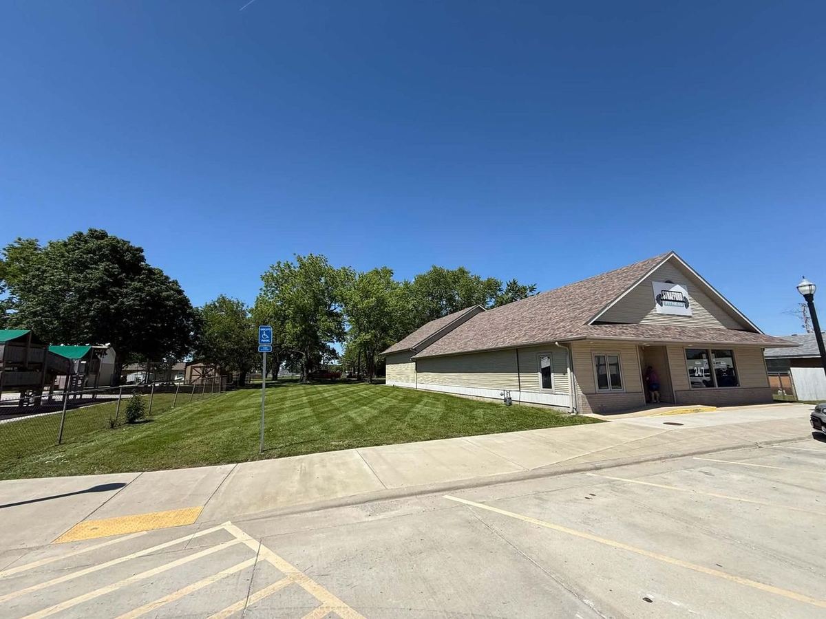 Commercial building with a freshly mowed lawn